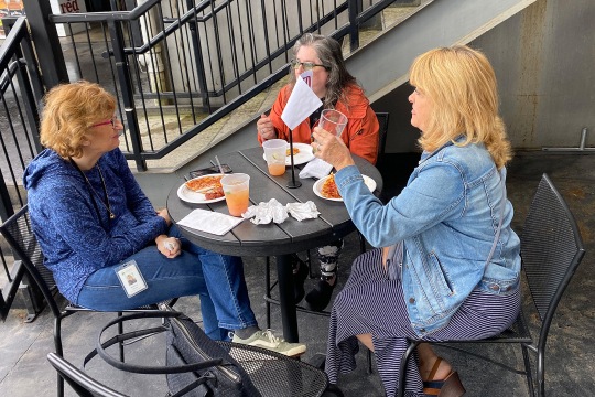 RIT/NTID alums were sitting at the table, enjoying their appetizers/beverages and chatting. Photo credit: Sara Smania