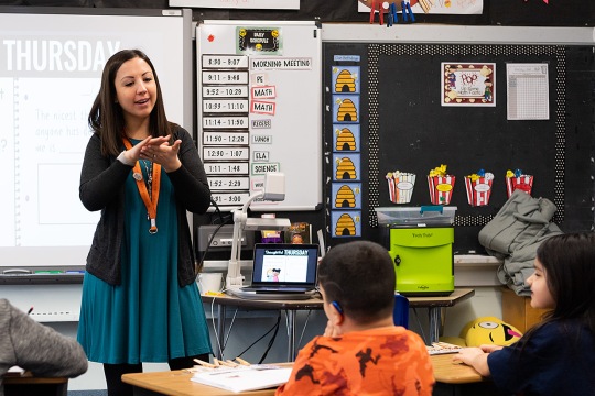 Photo of Gina Pennington teaching in a classroom