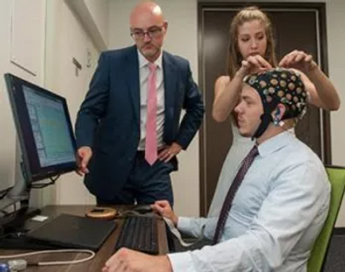 Matt Dye and assistant with research subject