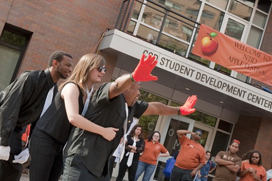 People performing in plaza