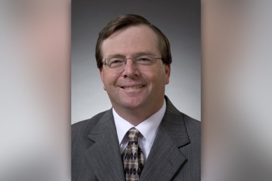 Professor posing for camera