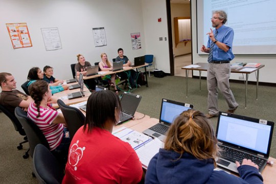 Professor teaching in classroom