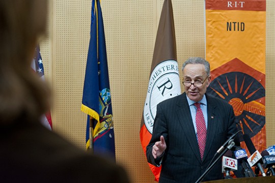 Senator speaking at podium