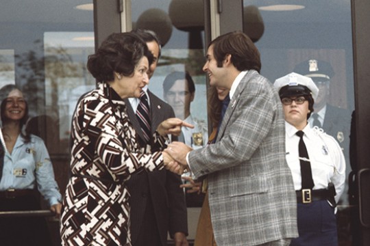 Lady Bird Johnson shaking hands with Bill Ingraham.