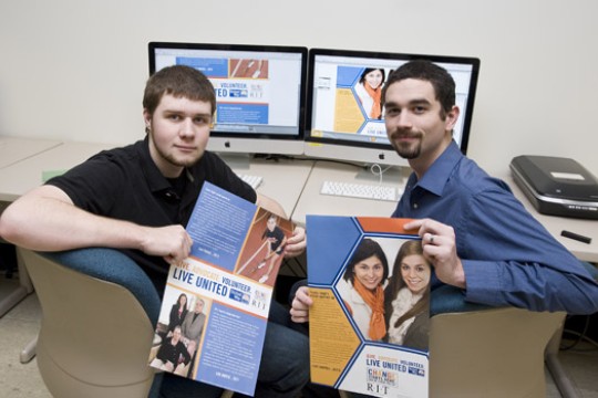 People posing with posters