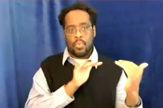 professor using sign language.
