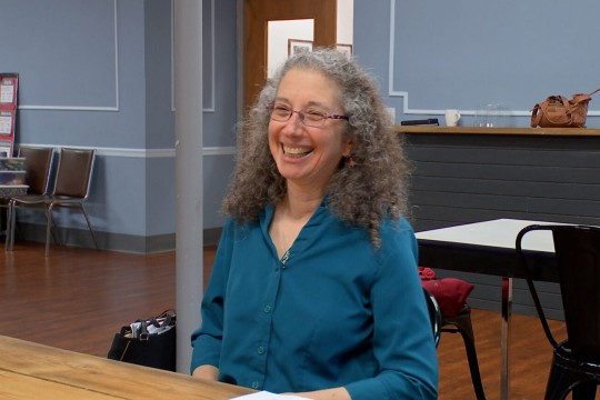 Diana Pryntz sitting at table.