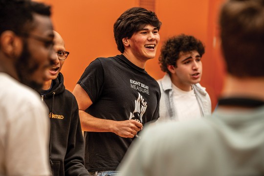 college students singing in an a cappella group.