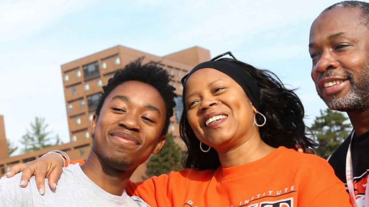 A family taking a selfie during orientation at RIT.