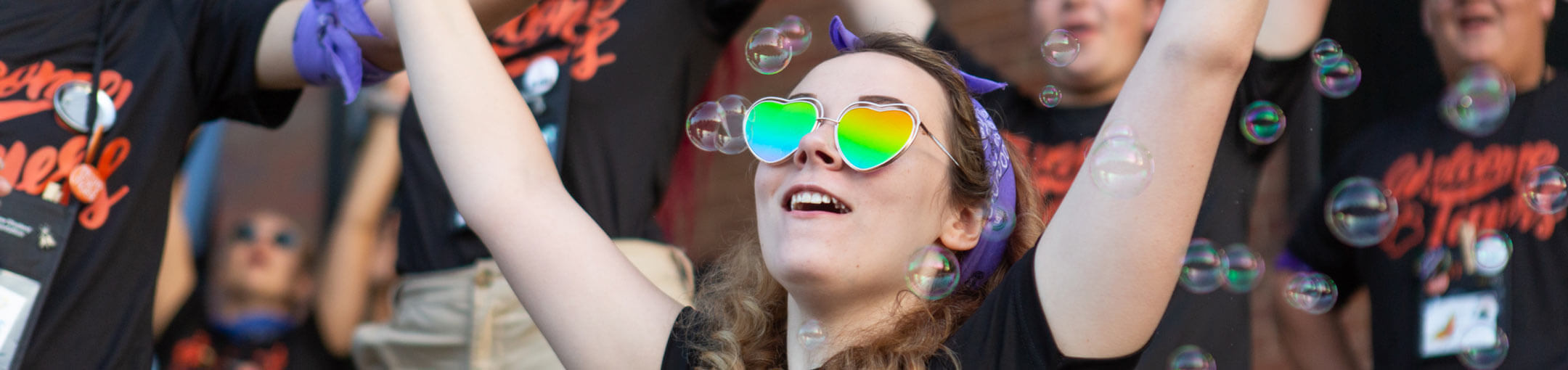 A closeup of an RIT student wearing sunglasses during orientation.