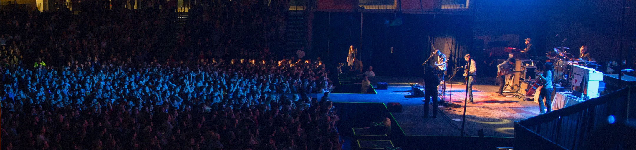 R I T students in a crowd during a concert on campus.