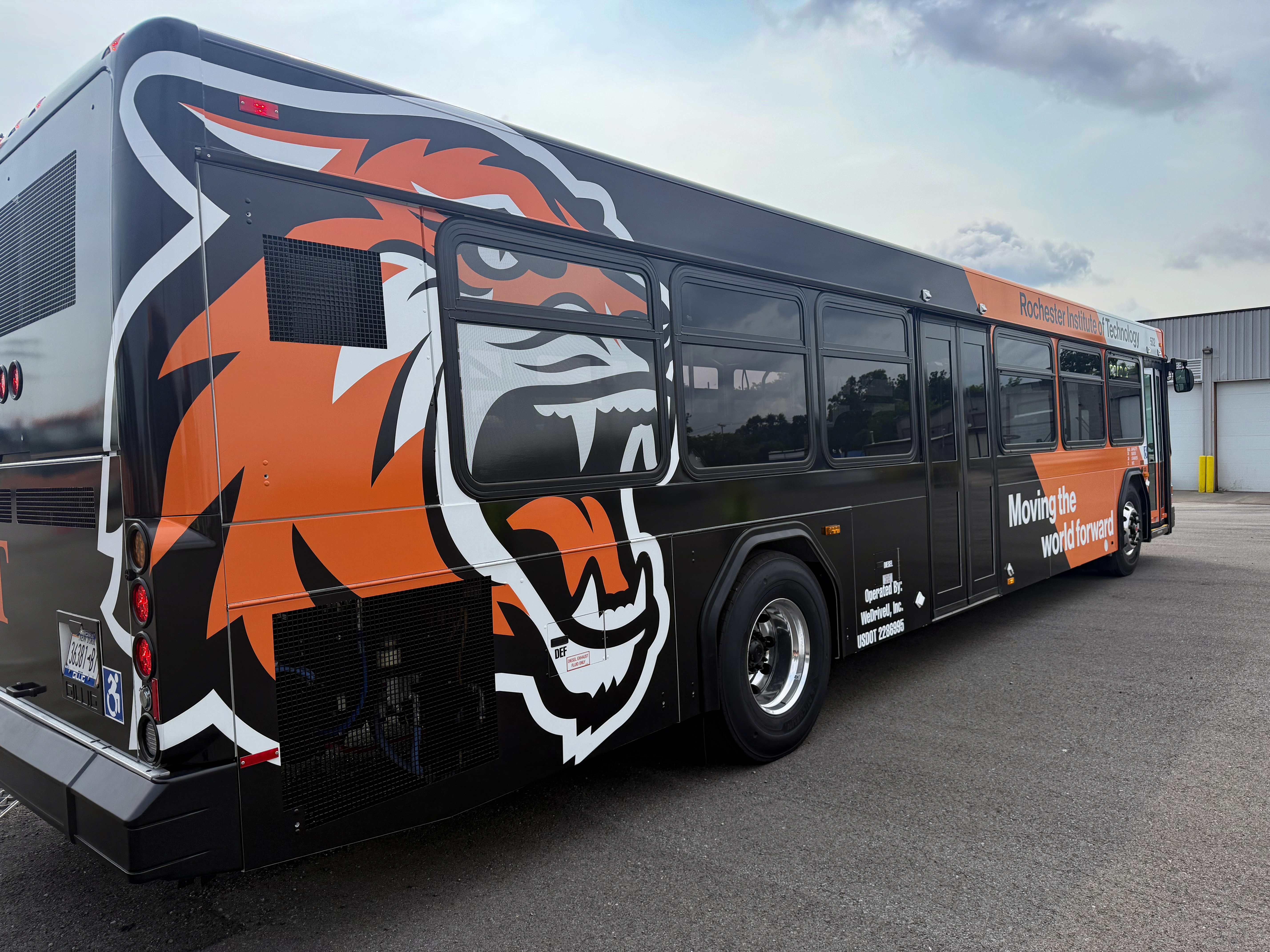 tiger head on a black bus