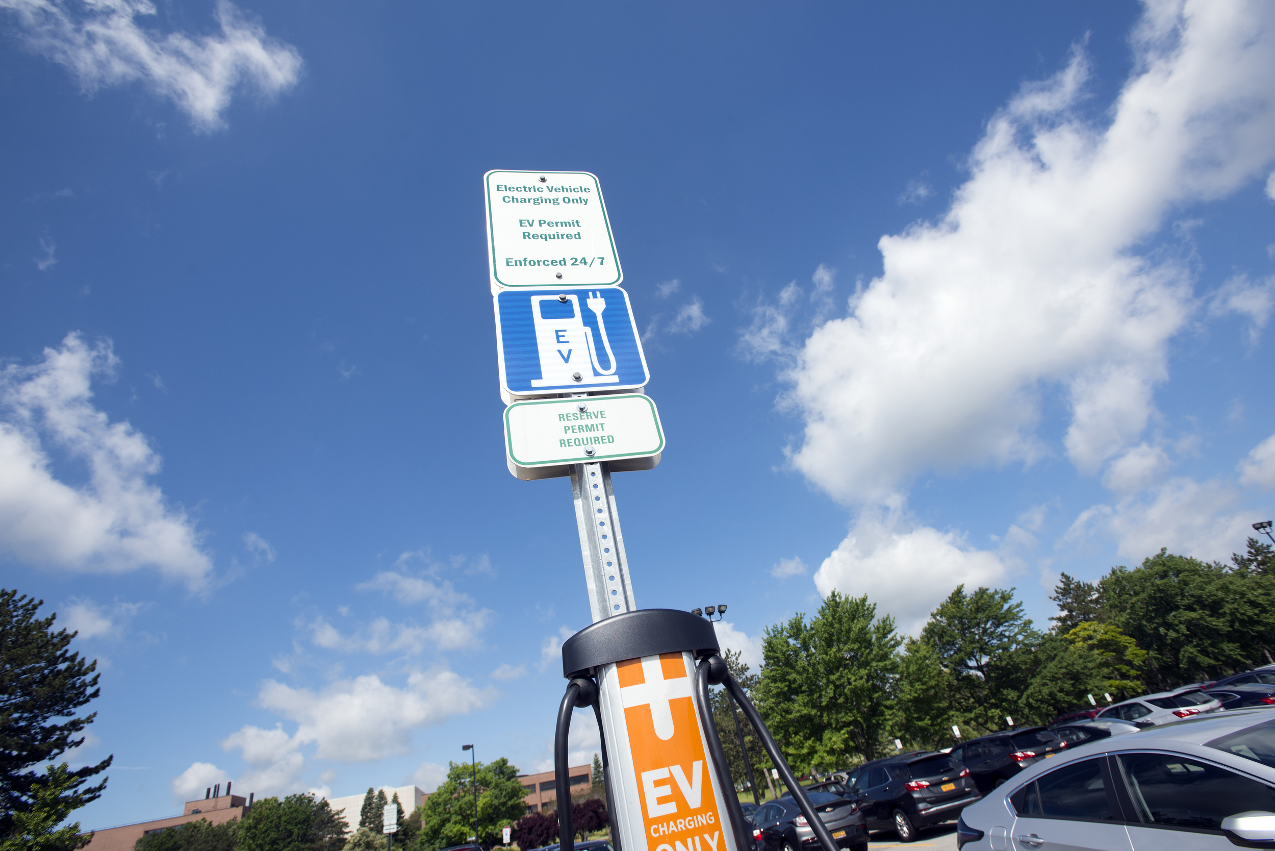 EV sign with blue sky
