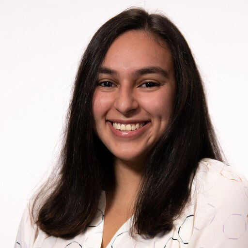 Headshot of Andrea Camacho-Betancourt.