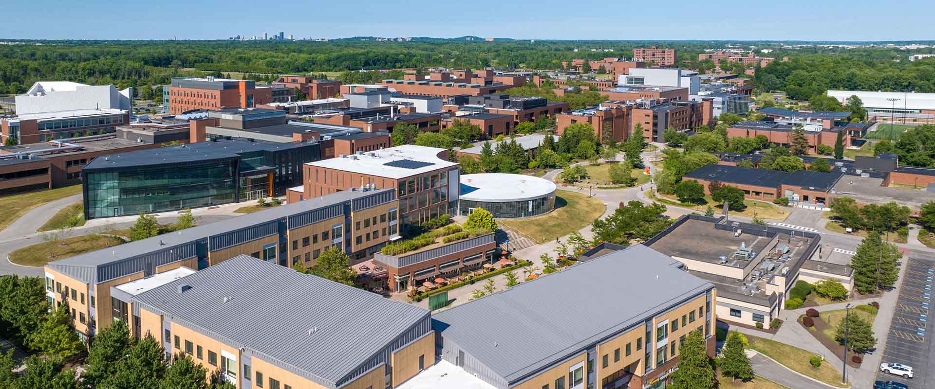 aerial view of buildings and green spaces on the R I T campus.