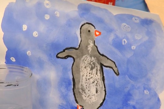 watercolor painting of a penguin.