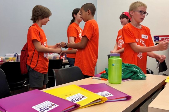 Middle school students working on communication skills