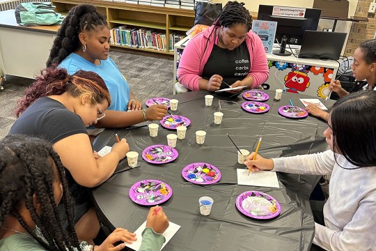 middle school students in STEP work on a stress management art project