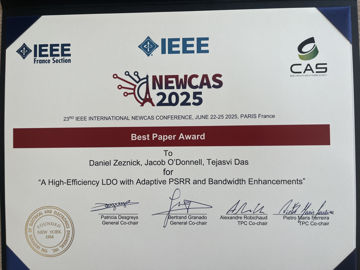 Paper certificate from the NEWCAS 2025 conference that lists "A High-Efficiency LDO with Adaptive PSRR and Bandwidth Enhancements" by Daniel Zeznick, Jacob O'Donnell, and Tejasvi Das as the best paper. 