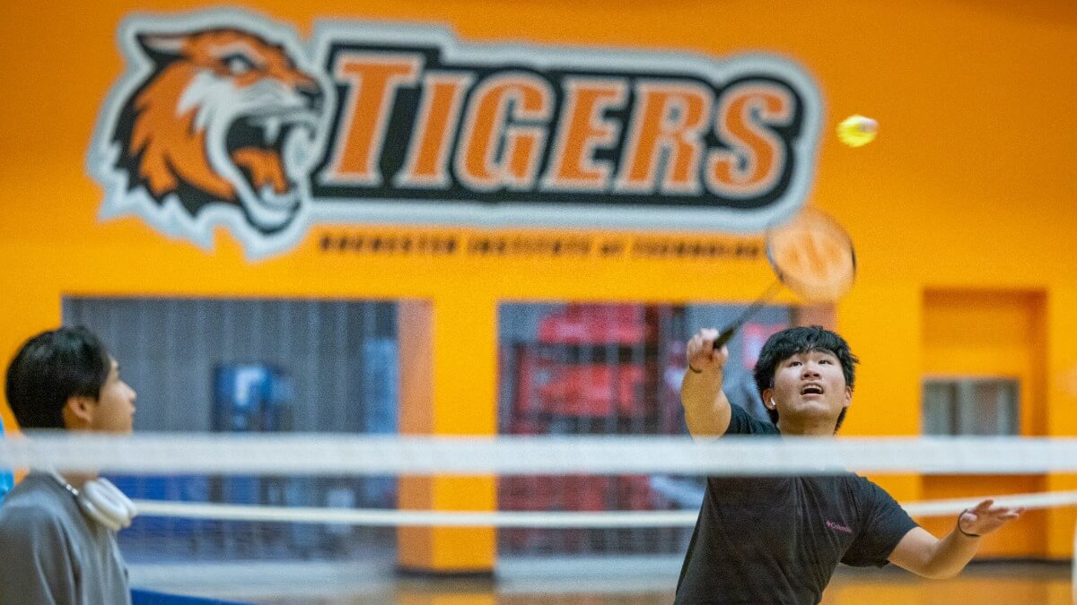 Students playing badminton at the Hale-Andrews Student Life Center.