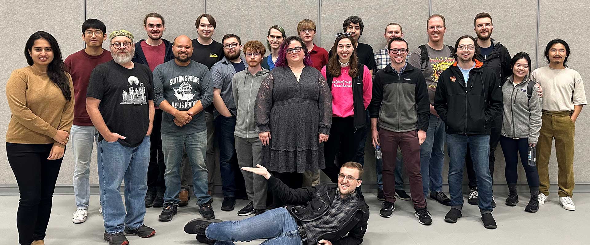 a large group of people gathered for a group photo.