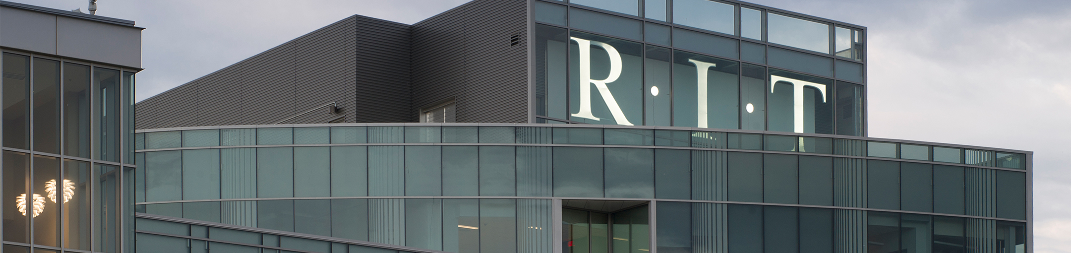 RIT Logo on top of Institute Hall