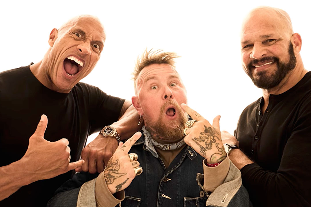 Three men pose playfully together against a white background.