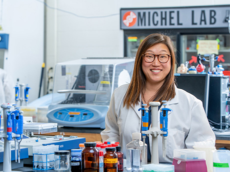 Lea Michel standing in her chemistry lab