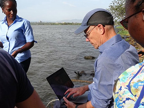 Professor Anthony Vodacek out in the field