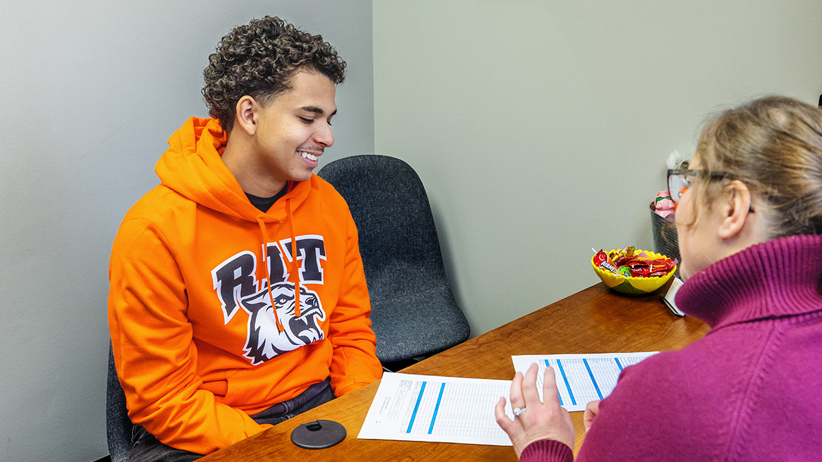 RIT student talking to an Academic Advisor