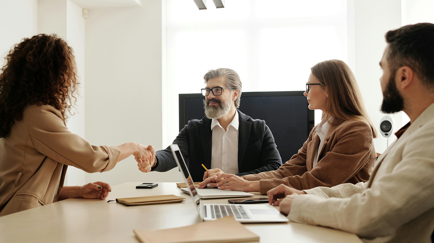 people sitting in a boardroom