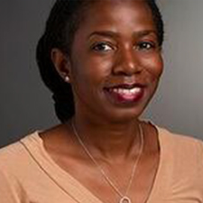 headshot of Dr. Uche