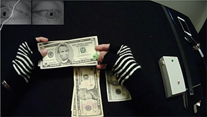 person holding paper money