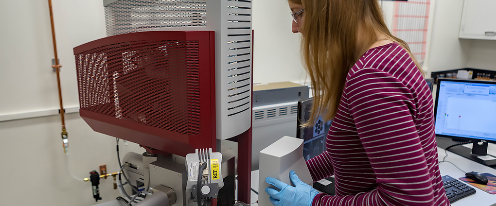 student working on equipment in NanoImaging Lab