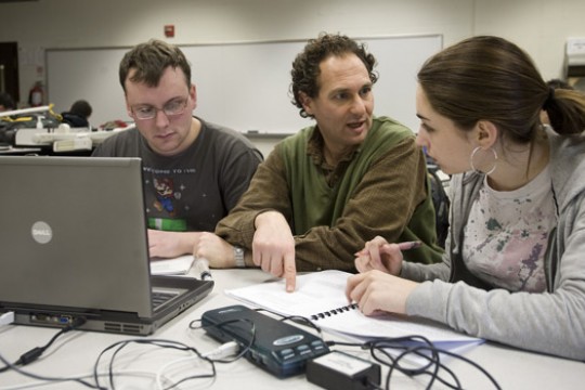 Professor working with students