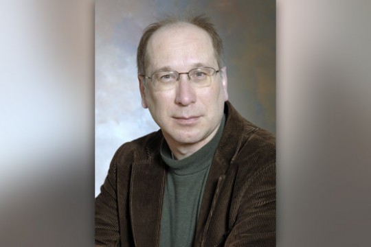 Professor posing for camera