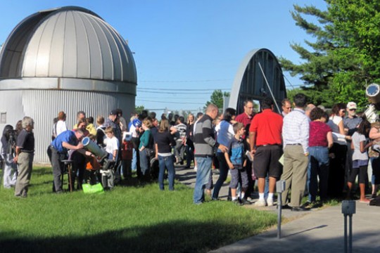 People gathered outside observatory 