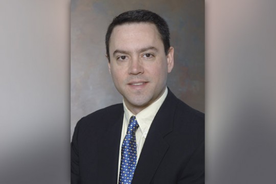 Professor posing for camera