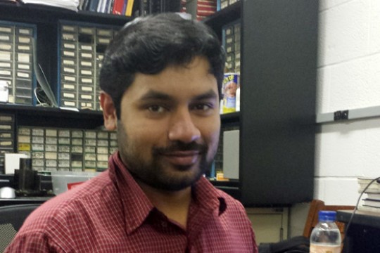 Person posing in office