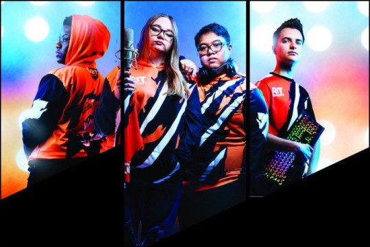 four esports students posing like an album cover.
