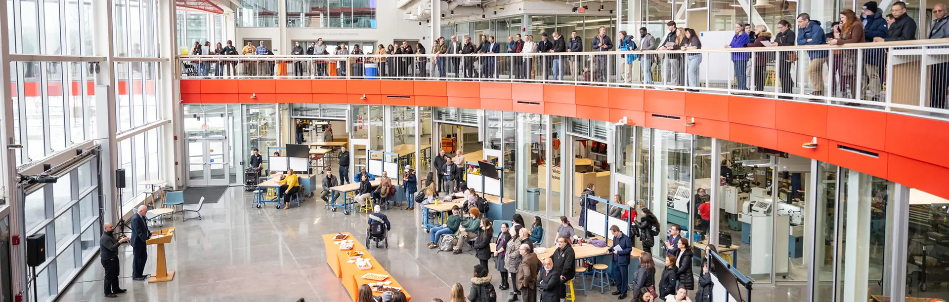Former R I T President, David Munson, giving a speech in the Atrium of the SHED.