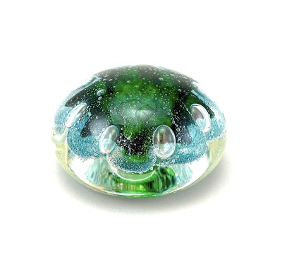 Handblown clear Glass orb with bubbly green and blue organic shape inside.