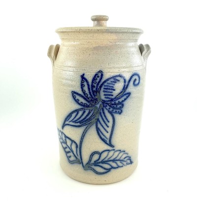 LIdded ceramic vessel with compact side grasp handles. Glaze is light grey with hand illustrated floral decoration in cobalt blue titled 'Floral'.