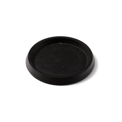 Round black cast iron tray.