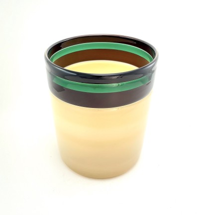 a glass cylinder with a smooth surface and ivory color base, a band of purple and green colored bands around the rim.