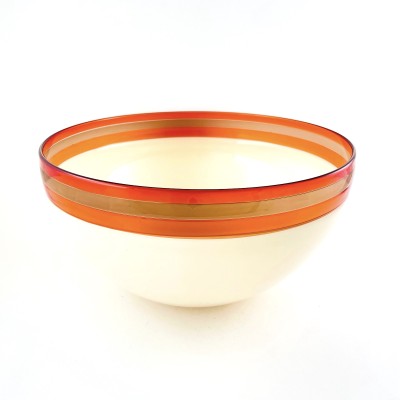a glass bowl with a smooth surface and ivory color base, a band of rose, bronze and melon colored band around the rim.