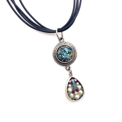 two pendants made from glass shards set in resin with a tear drop set with pearls and beads.