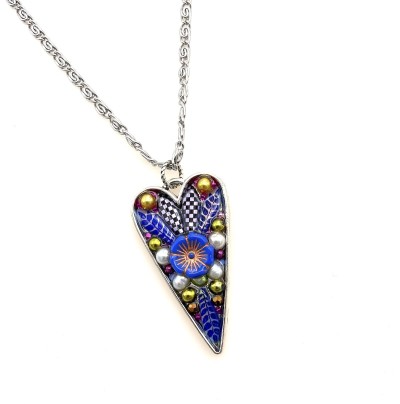 a heart shaped pendant with a cluster of beads encased in acrylic.