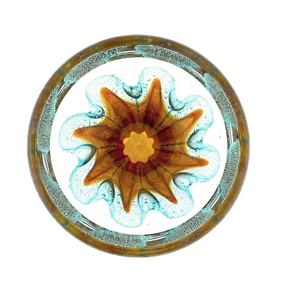 a round clear glass bowl with a starfish like gold design in the center with air bubbles around it.