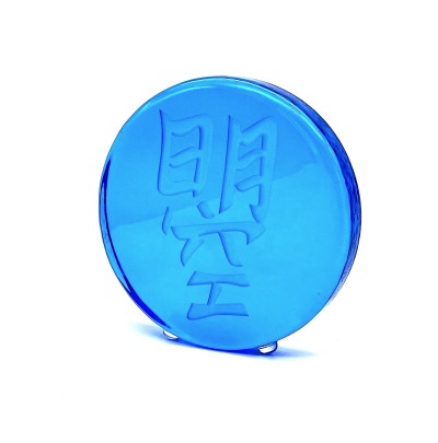 a blue round glass disc with the Chinese character 'Bright and Ambitious'.